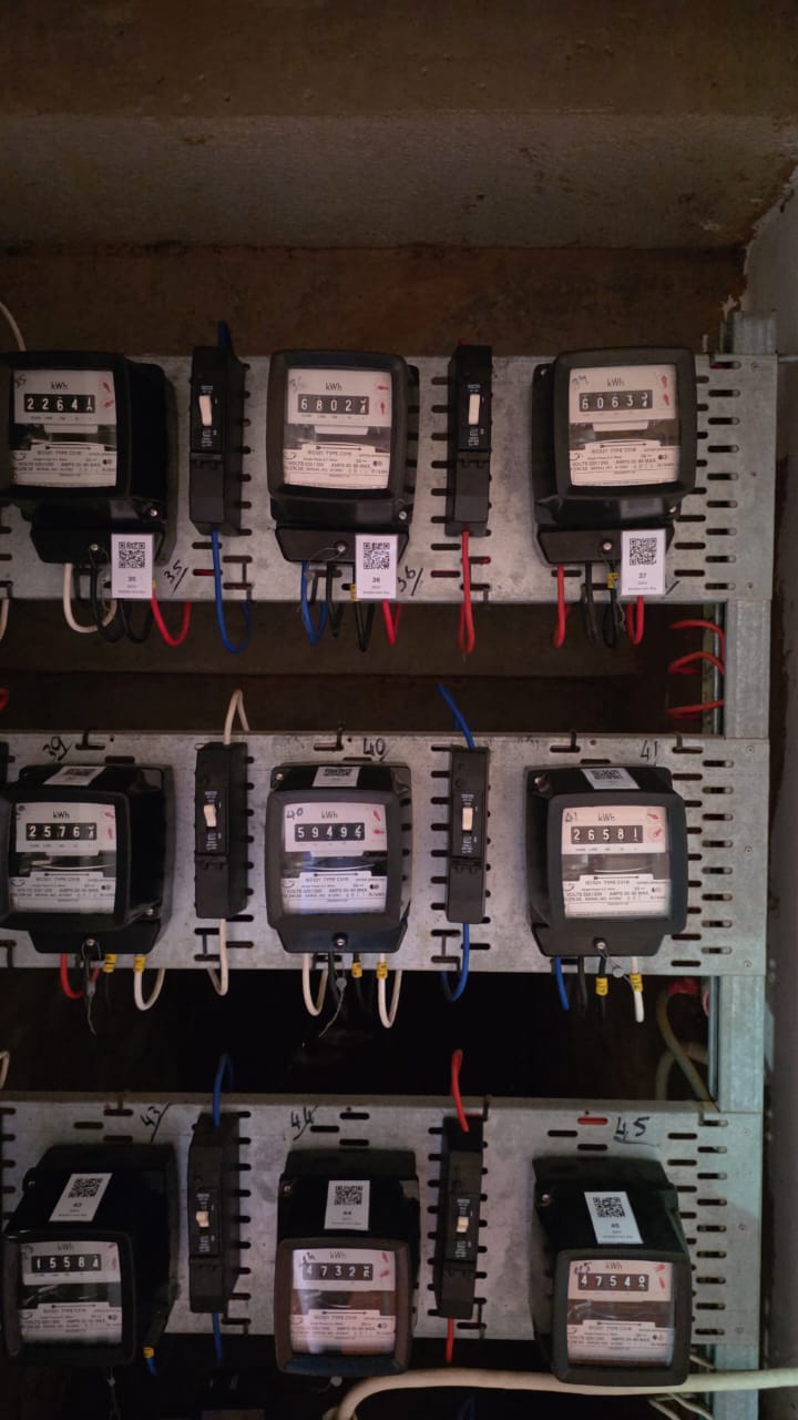 Actual customer electricity meter bank with QR identification labels
